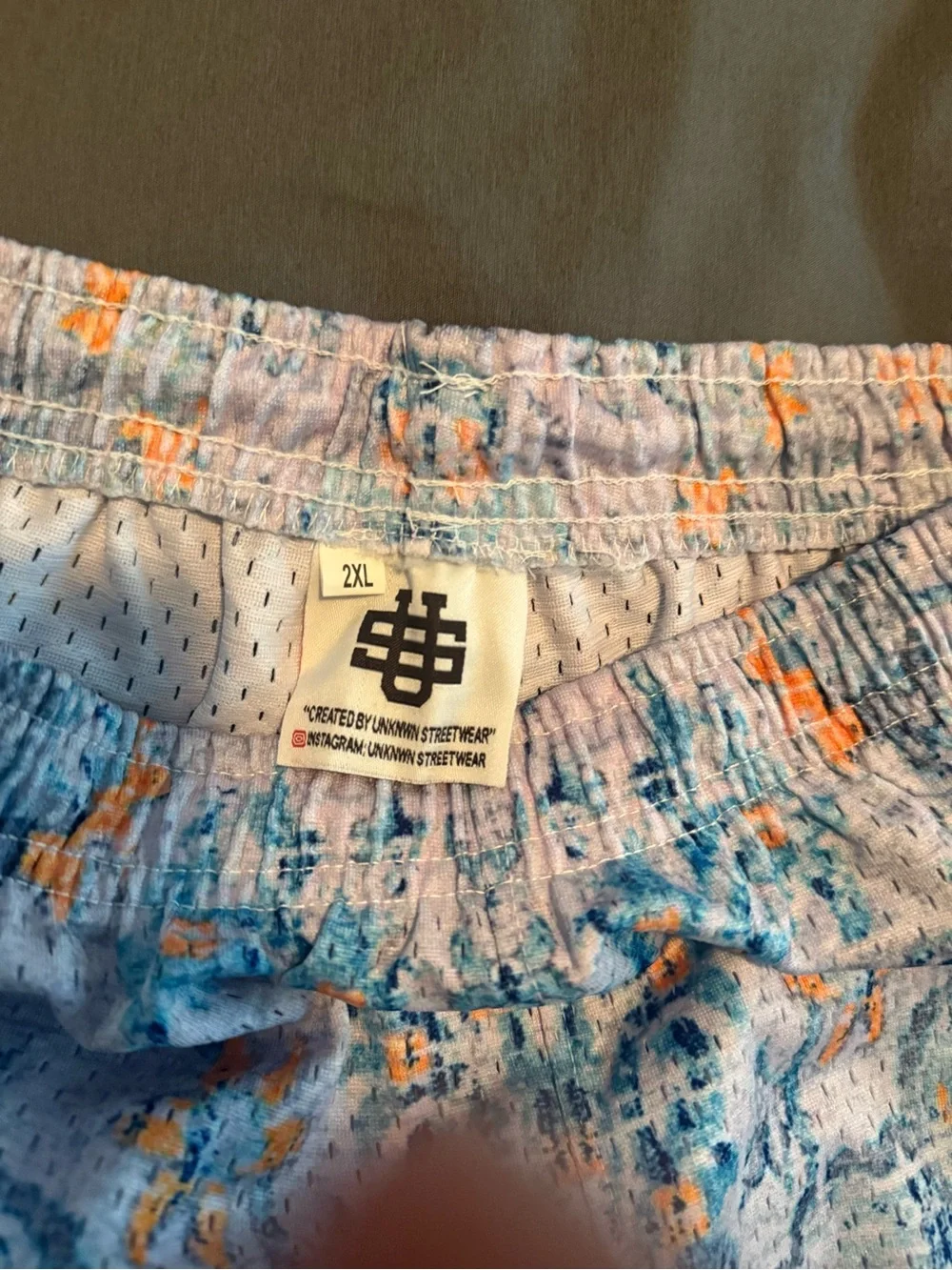 UNKNWN CREATIVE SHORTS - Men's Blue Patterned Athletic Shorts with Yellow Accent